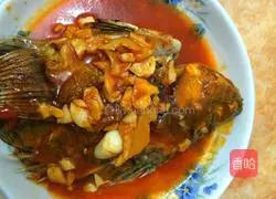 Illustration of how to make stuffed tilapia in tomato sauce 3