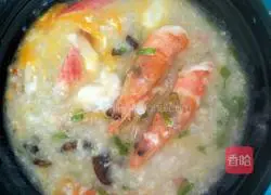 Illustration of how to make seafood scallop oatmeal porridge 11