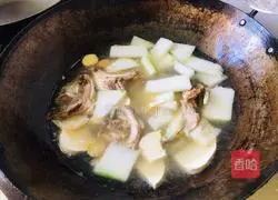 Illustration of how to make stewed tofu with winter melon and fish head 3