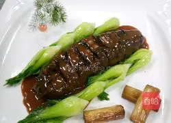 Illustration of how to cook sea cucumber with green onions 3