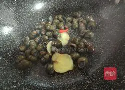 Illustration of how to make fried snails with soy sauce 6