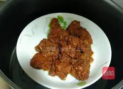 Illustration of how to make steamed pork ribs with braised rice flour 7