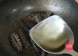 Illustration of how to cook sea cucumber with green onions 15