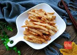 Illustration of how to make dry fried lotus root sticks 11