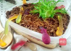 Illustration of how to make earthworm box cake 8