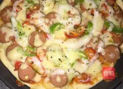 Pictures of making sausage pizza 4