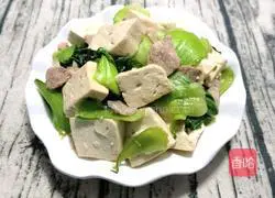 Illustration of how to make fried pork with rape and tofu 10