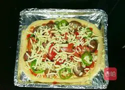Pictures of making sausage pizza 8