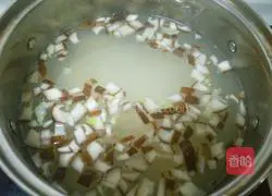 Illustration of how to make white rice and vegetable porridge 7