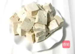 Illustration of how to make stir-fried pork with rape and tofu 4