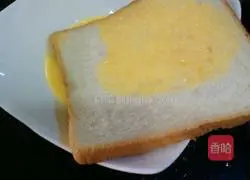 Illustration of how to make toast with fried eggs 3