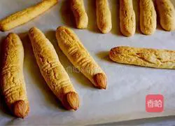 Illustration of how to make Halloween finger cookies 14