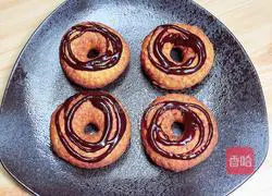 Illustration of how to make colorful pumpkin donuts 11