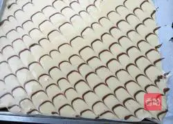 Illustration of how to make orange and tiger skin cake rolls 18