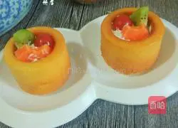 Illustration of how to make orange cream fruit cup cake 19