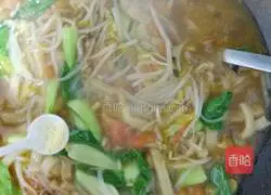 Illustration of how to make tomato and bean sprouts braised cake 9