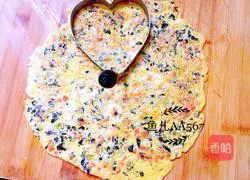 Illustration of how to make carrot and fungus egg cake 8