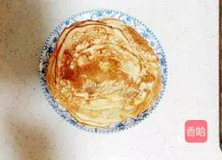 Illustration of how to make corn flour pancakes (tanhuang'er) 11
