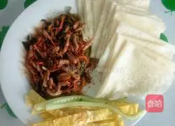 Illustration of how to make shredded pork burrito 11