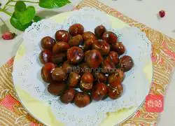 Illustration of how to roast chestnuts in an electric pan 6