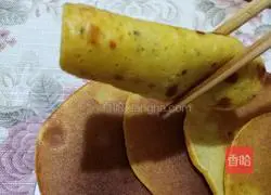 Illustration of how to make bean dregs and cornmeal pancakes 9