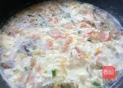 Illustration of how to make tomato and egg braised cake 19