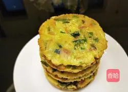 Illustration of how to make egg, carrot and spinach cake 7