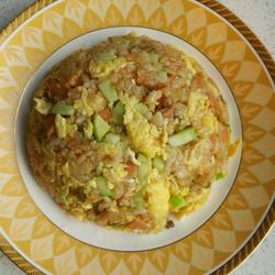 Fried rice with pickled mustard, ham, sausage and egg
