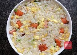 Illustration of how to make sausage, carrot and egg fried rice 10