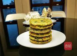 Illustration of how to make egg, carrot and spinach cake 8