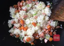 Illustration of how to make sausage, carrot and egg fried rice 8