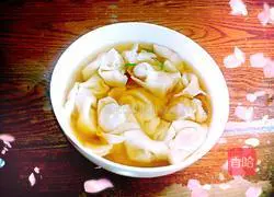 Illustration of how to make fresh meat Yuanbao wontons 18