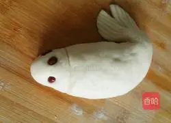 Illustration of how to make carp steamed buns 13