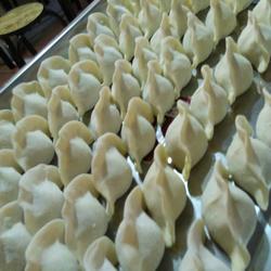 Carrot and three fresh dumplings