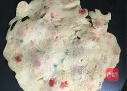 Illustration of how to make cherry tomatoes, eggs, ham, sausage, lettuce wraps 9