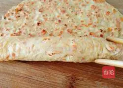 Illustration of how to roll ham sausage with carrot and egg pancake 9