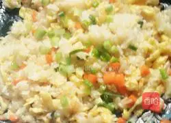 Illustration of how to make carrot and egg fried rice 12