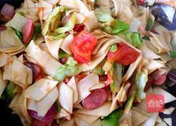 Illustration of how to make fried noodles with vegetables and ham 12