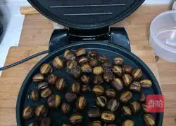 Illustration of roasting chestnuts in electric cake stall 3
