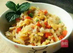 Illustration of how to make carrot and egg fried rice 13