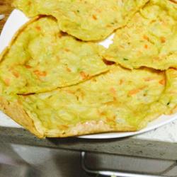 Baby cabbage, carrot and shredded egg pancake