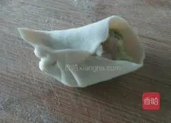 Illustration of how to make celery and meat dumplings 10