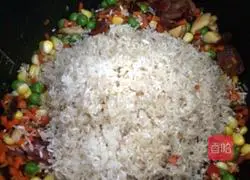 Illustration of how to make braised sausage rice (rice cooker version) 7