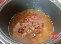 Illustration of how to make braised rice with sausage and mixed vegetables 8