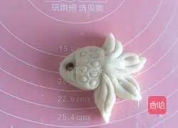 Illustration of how to make goldfish steamed buns 18