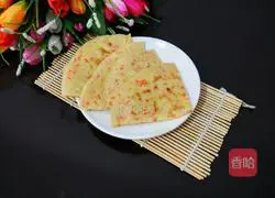 Illustration of how to make shredded carrot egg pancake 9