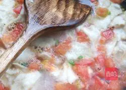 Illustration of how to make tomato, egg and egg pancakes 12