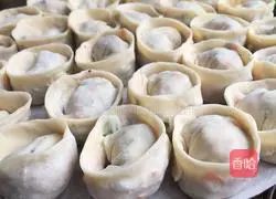 Illustration of how to make juicy Yuanbao dumplings 19