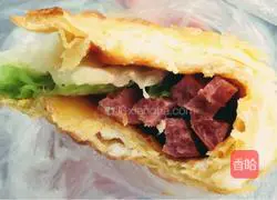 Illustration of how to make egg-filled pancakes and sausages 15