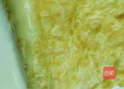 Illustration of how to make egg pancakes rolled with ham 8